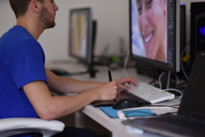 graphic artist at computer