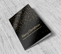 A black Christmas greeting card on a grey background
